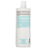 MOROCCANOIL - Smoothing Conditioner For Fizzy Hair 235999 1000ml/33.8oz