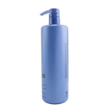 PAUL MITCHELL - Spring Loaded Frizz-Fighting Shampoo (Cleanses Curls, Tames Frizz)  PMI134 710ml/24oz